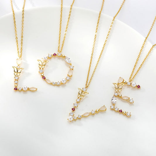 four Initial Necklaces for Women  are put together in a form of word "LOVE"