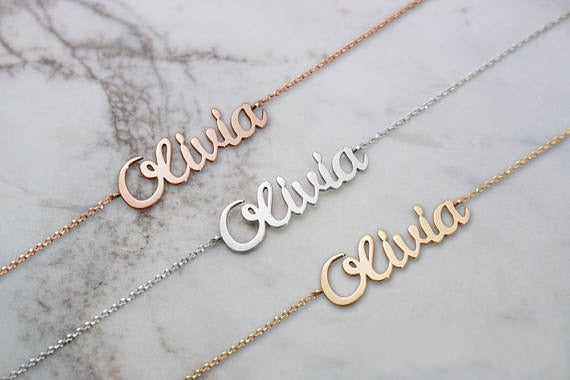 Custom Name Bracelet with name Olivia in three metal colours