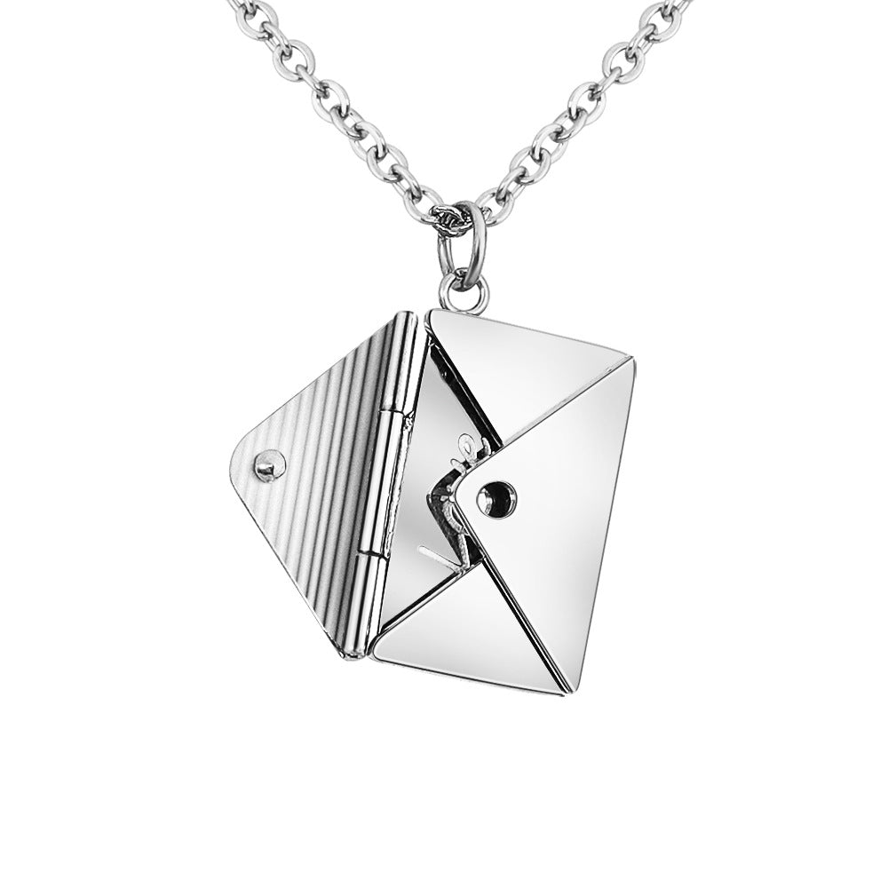 Pendant in a form of envelope in a silver color.